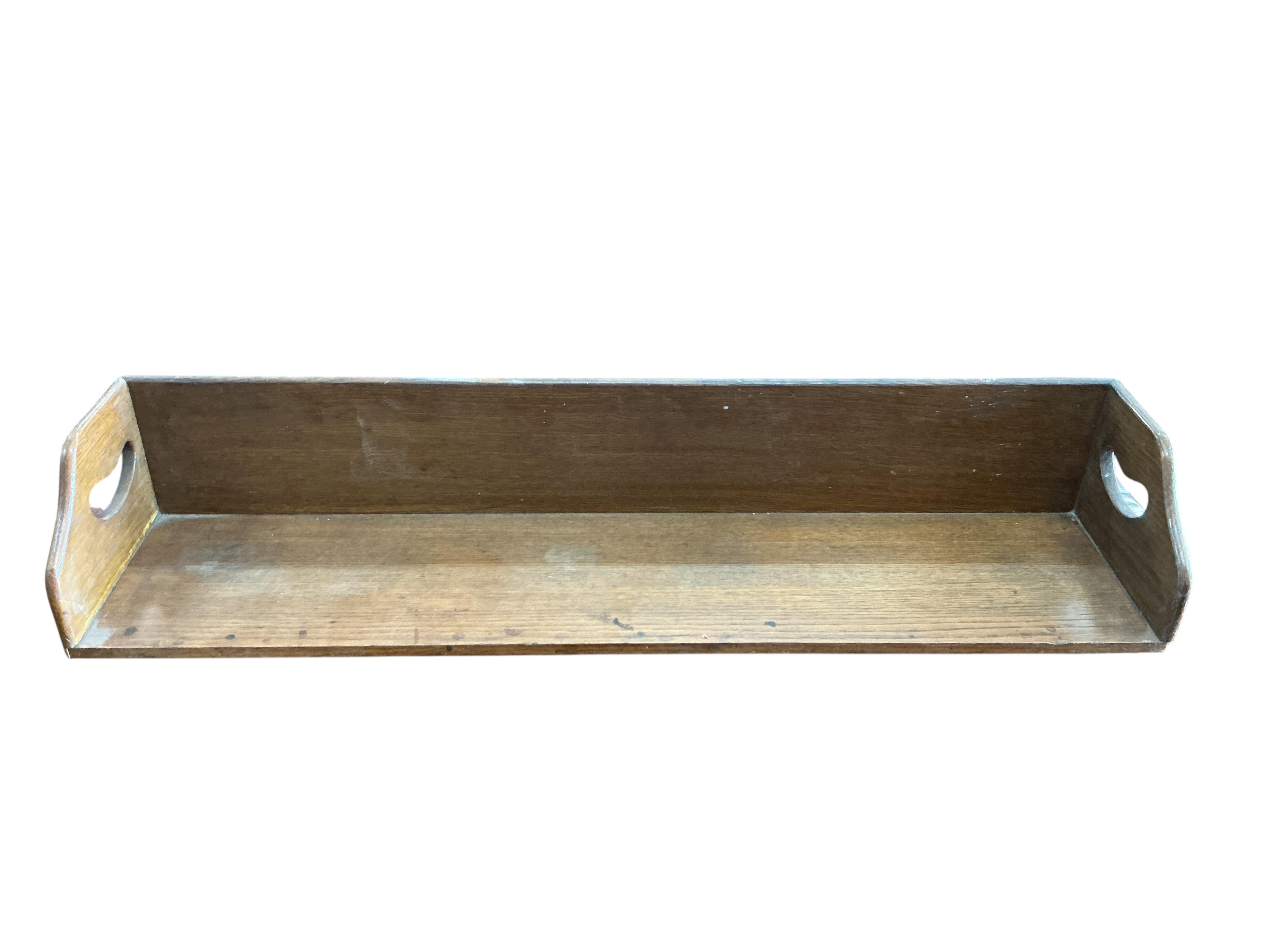 A pair of oak book troughs, width 86cm, depth 20cm, height 15cm